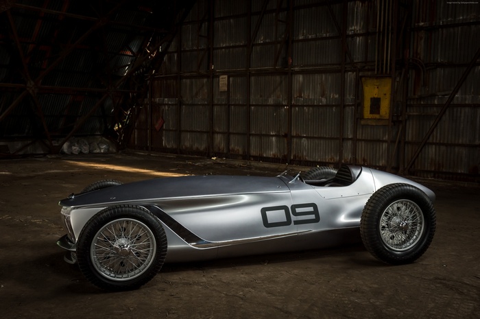 Infiniti Prototype 9 electric car in a warehouse