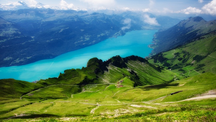 Turquoise Lake and Green Mountains in the Alps, Switzerland