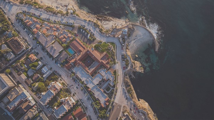 Aerial view of coastal town with ocean