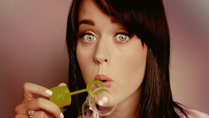 Katy Perry blowing bubbles