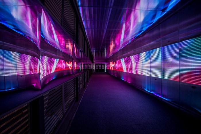 Futuristic tunnel with colorful LED lights