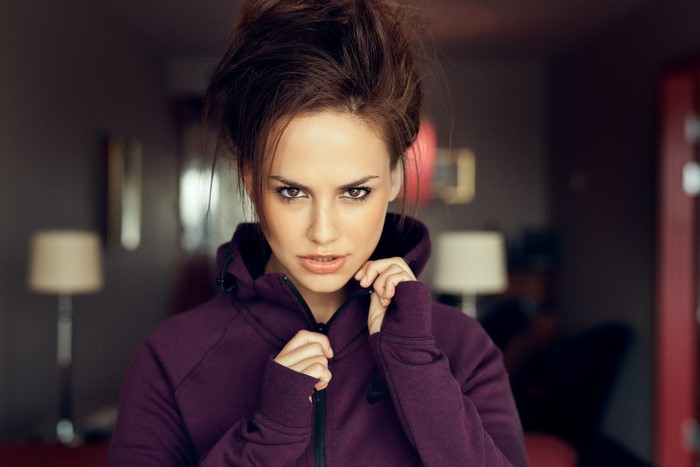Woman in a purple hoodie