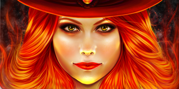 Woman with fiery red hair and a red hat