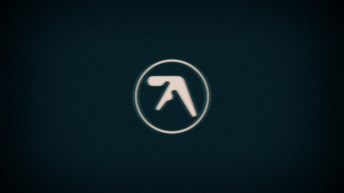 Aphex Twin logo on dark background