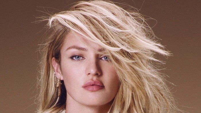 Close-up portrait of Candice Swanepoel with blonde hair