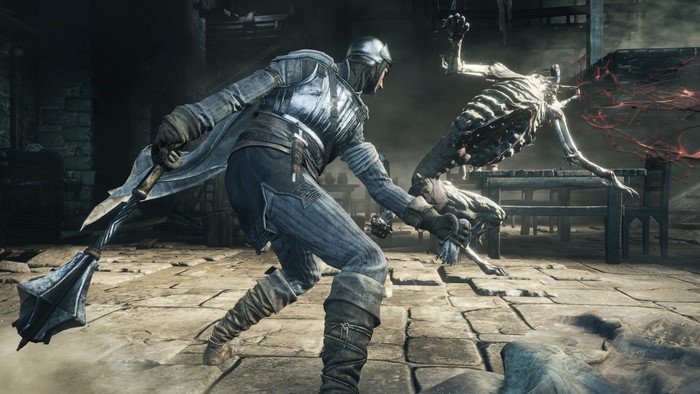 Dark Souls III screenshot of a knight fighting a skeleton monster