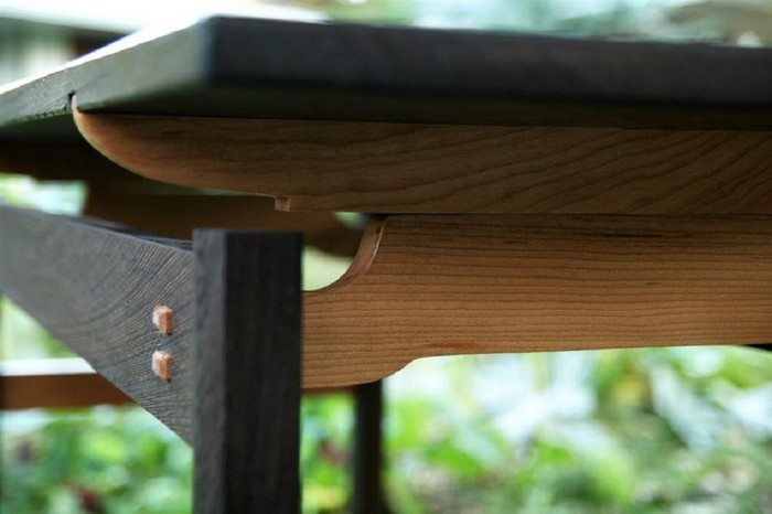 Close-up of a wooden table's joinery