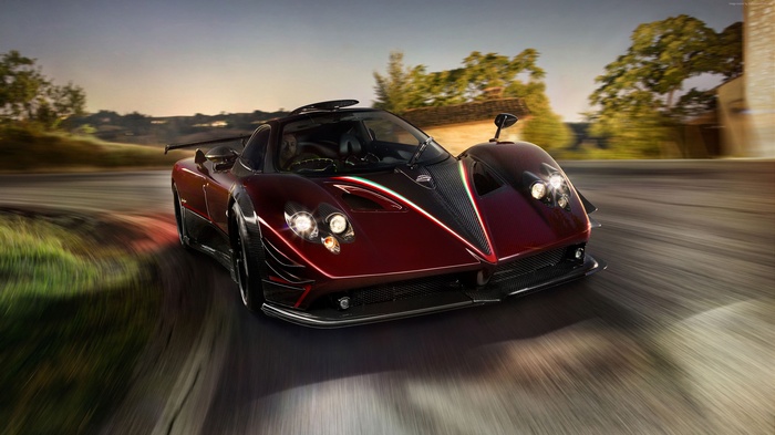 Pagani Zonda Fantasma Evo driving on a road