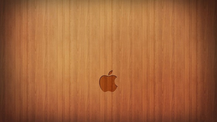 Apple logo on a wooden surface
