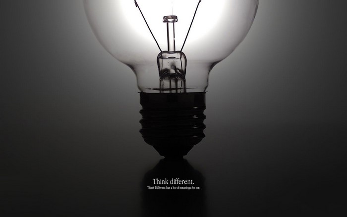 Incandescent light bulb with "Think different." quote