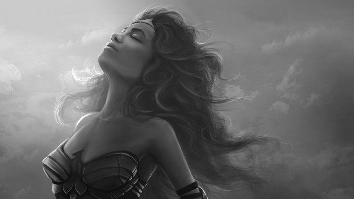 Wonder Woman in black and white with wind-blown hair