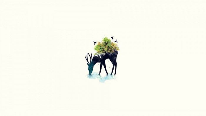 Deer with tree on back and birds flying