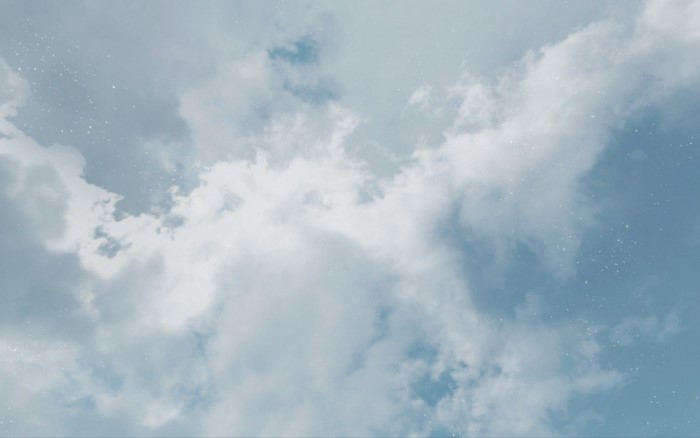 Sky with clouds and stars