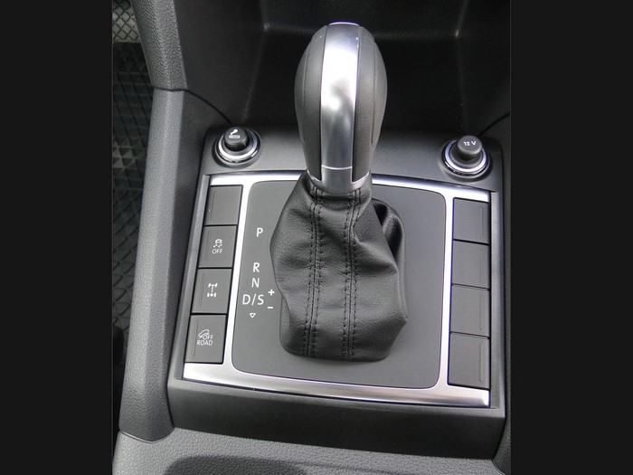 Car interior with automatic gear shifter and buttons