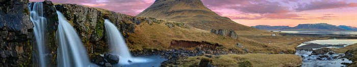 Kirkjufell mountain and waterfall panorama in Iceland