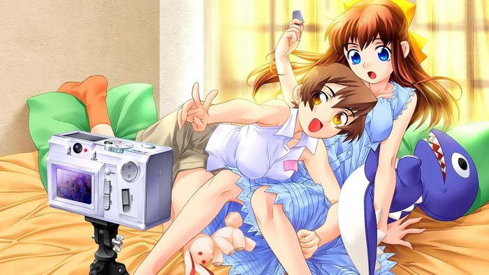 Two anime girls taking a selfie with a camera