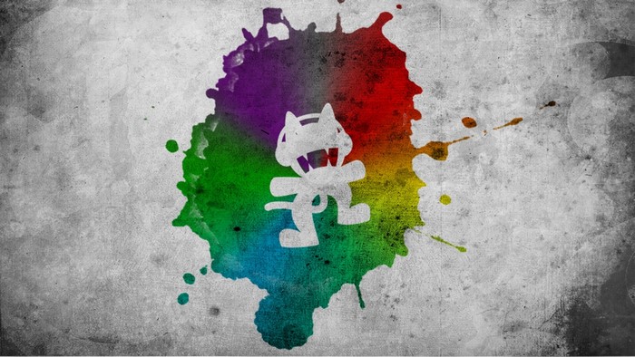 Monstercat logo on a colorful paint splatter