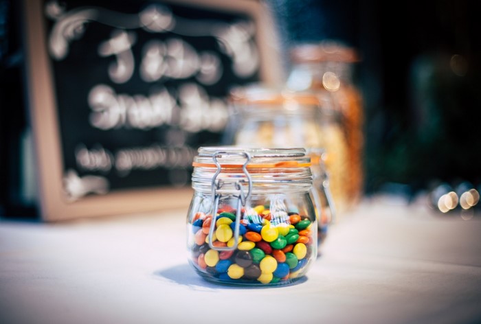 Glass jars filled with colorful candies