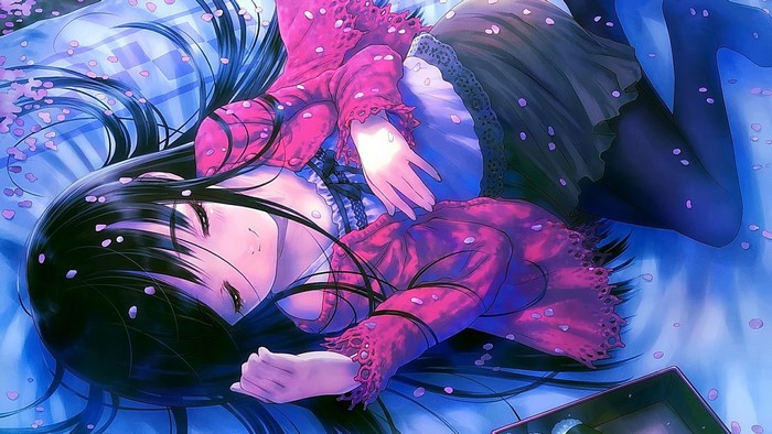 Anime girl sleeping on a blue surface with petals