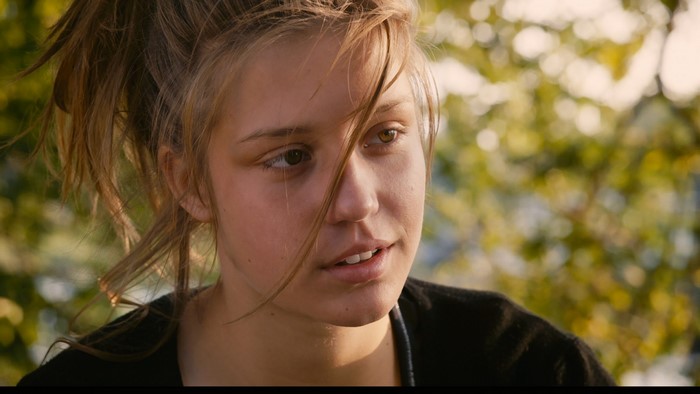 Adele Exarchopoulos in a close-up portrait