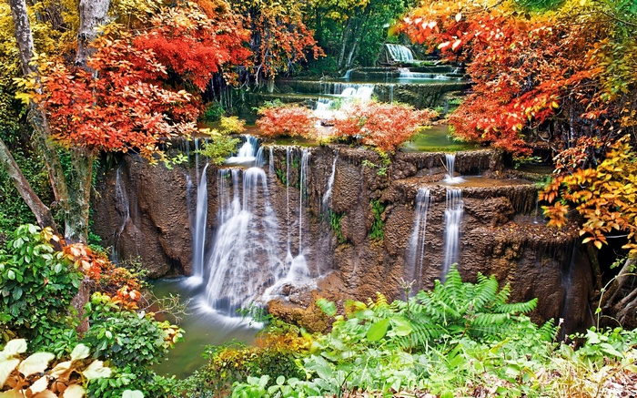 Tiered waterfall with autumn foliage