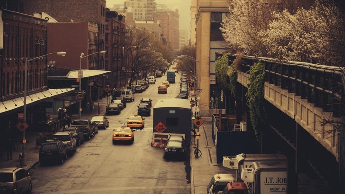 New York City street with traffic and buildings