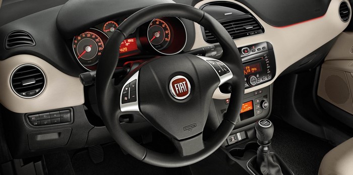 FIAT Punto car interior with steering wheel and dashboard