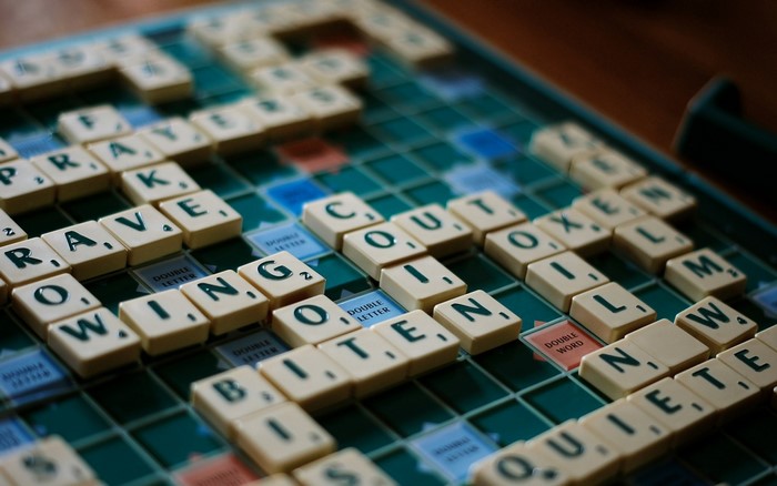 Scrabble board game with words and letters