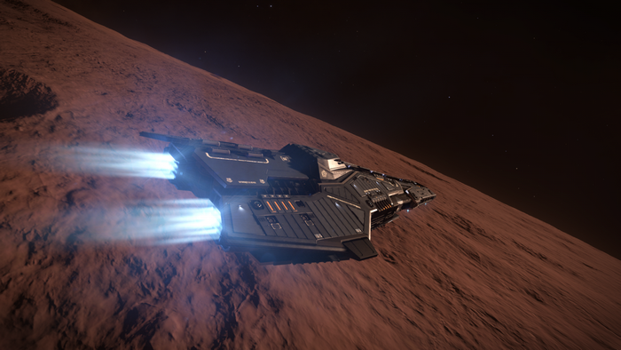 Spacecraft flying near a rocky planet in Elite Dangerous