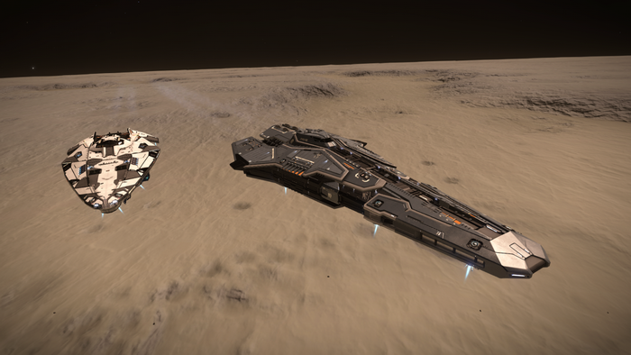 Two spaceships on a barren planet in Elite Dangerous