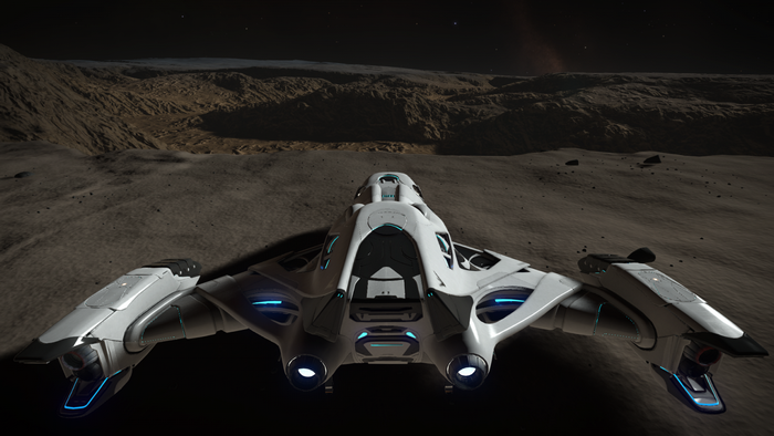 White spaceship on a rocky planet in Elite Dangerous