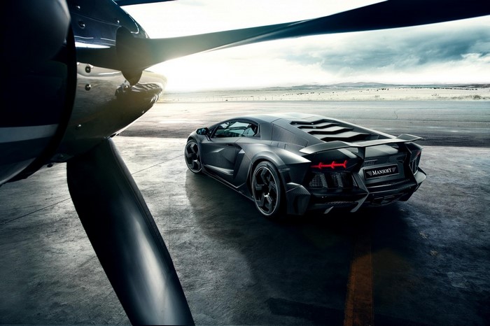 Mansory Lamborghini Aventador next to airplane propeller