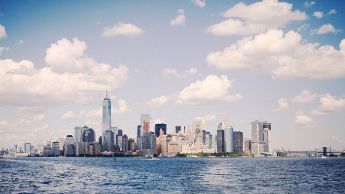 New York City skyline with One World Trade Center over the water