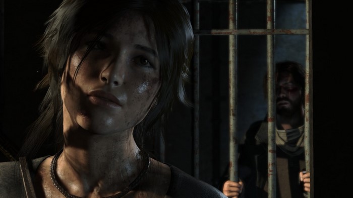 Lara Croft from Tomb Raider in a dark prison cell