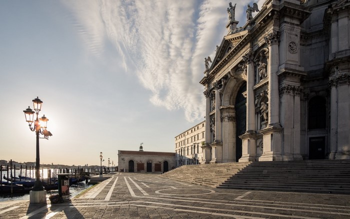 Venice cityscape with church and gondolas
