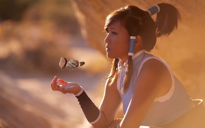 Korra cosplay with floating rocks