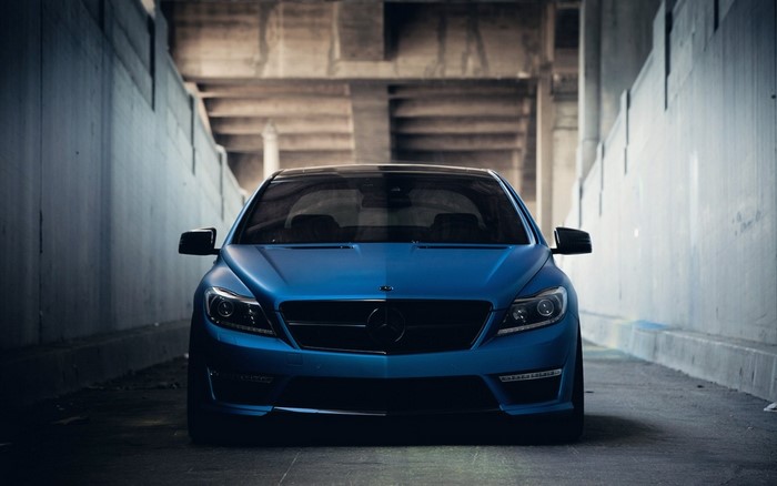 Blue Mercedes-Benz CL-Class parked in concrete tunnel