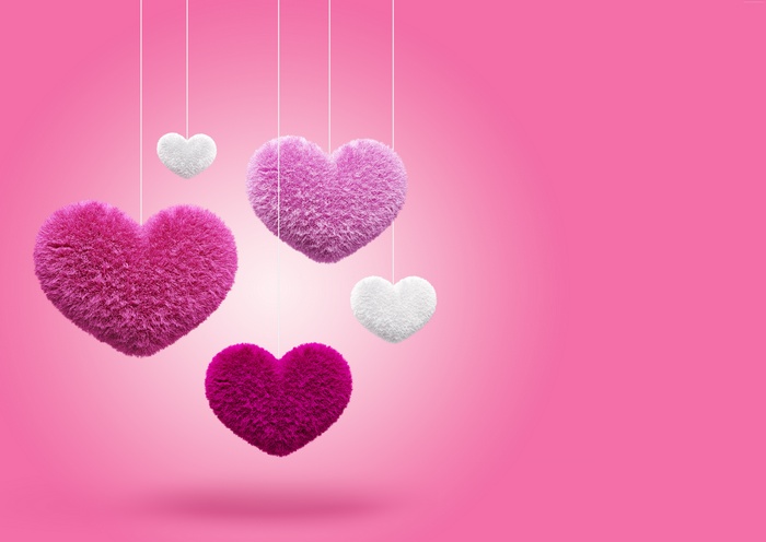 Fuzzy Hearts Hanging on Pink Background 4K