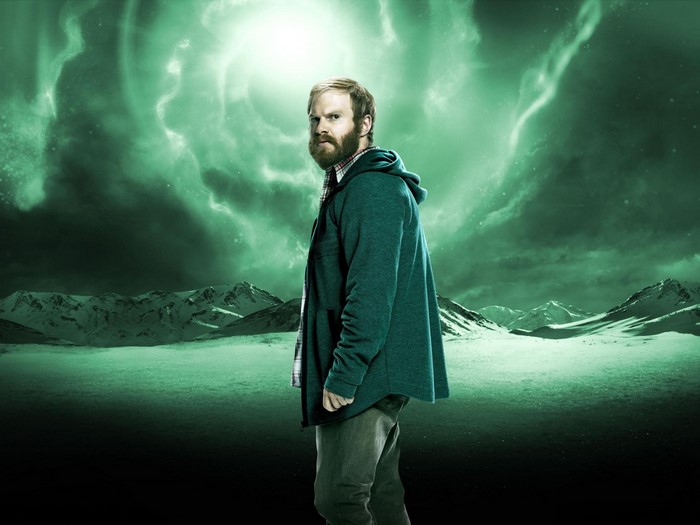Man from Heroes Reborn in a green landscape