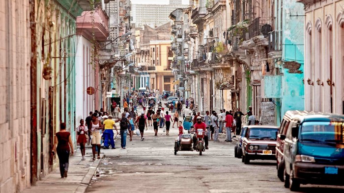 Street scene in Havana, Cuba with pedestrians and vehicles