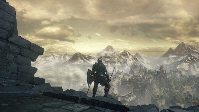 Dark Souls III knight overlooking a misty mountain city