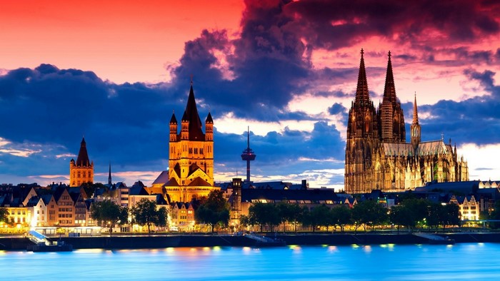 Cologne Cathedral and cityscape at sunset over the Rhine