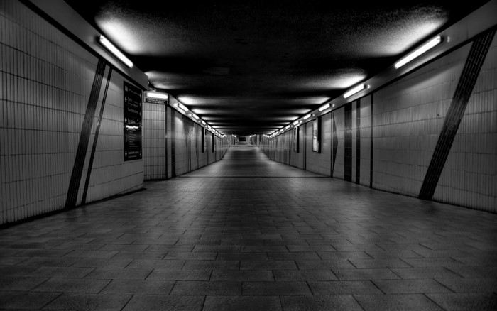 Monochrome tunnel with lights and shadows