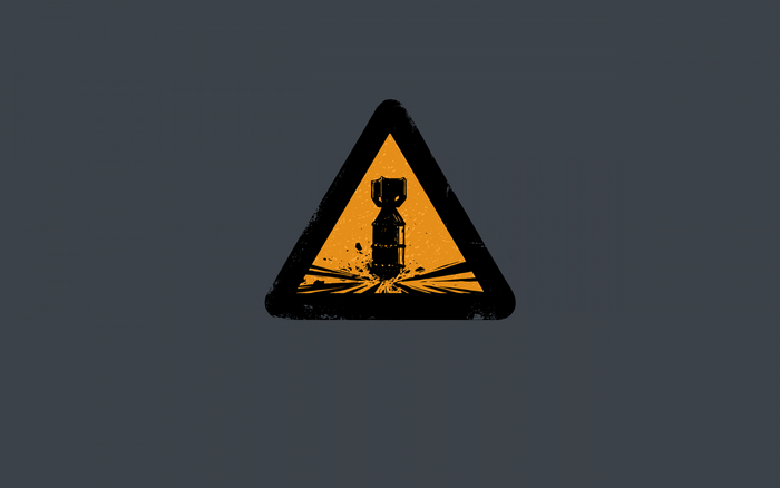 Warning sign with a bomb illustration