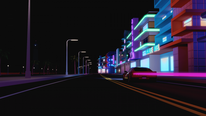 Car driving on a neon-lit street at night