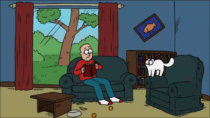 Simon's Cat reading a book in a living room