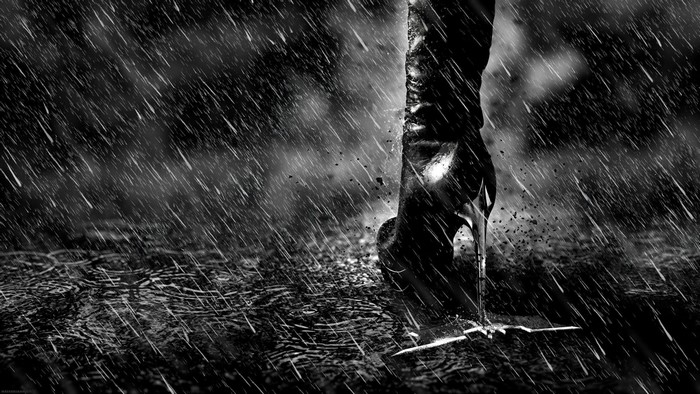 Catwoman from The Dark Knight Rises in the rain