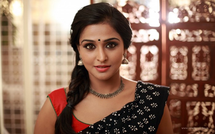 Woman with black hair and traditional Indian attire