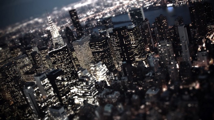 Aerial view of New York City skyscrapers at night