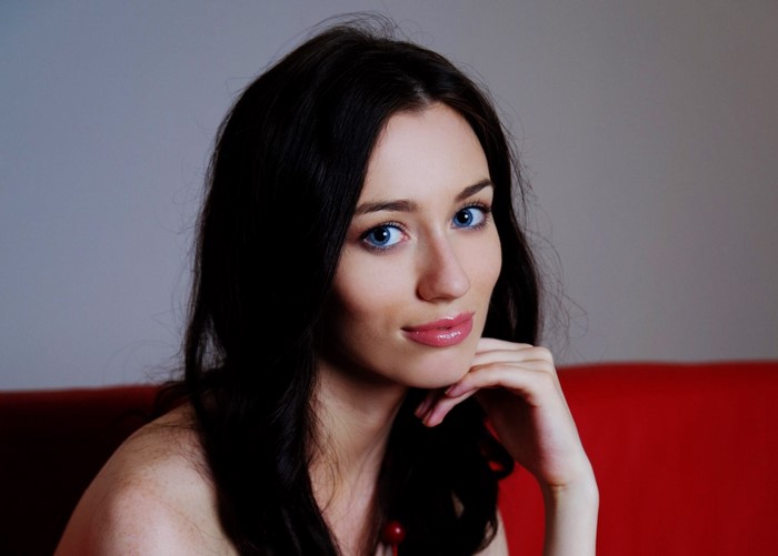 Portrait of a Young Woman with Blue Eyes